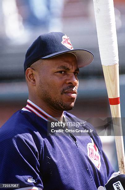 ALBERT BELLE AND HIS BAT, OF THE CLEVELAND INDIANS BEFORE AN A'S GAME IN OAKLAND.