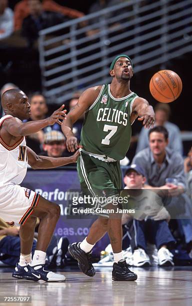 Point guard Kenny Anderson of the Boston Celtics passes the ball during the NBA game against the Denver Nuggets at the Pepsi Center in Denver,...