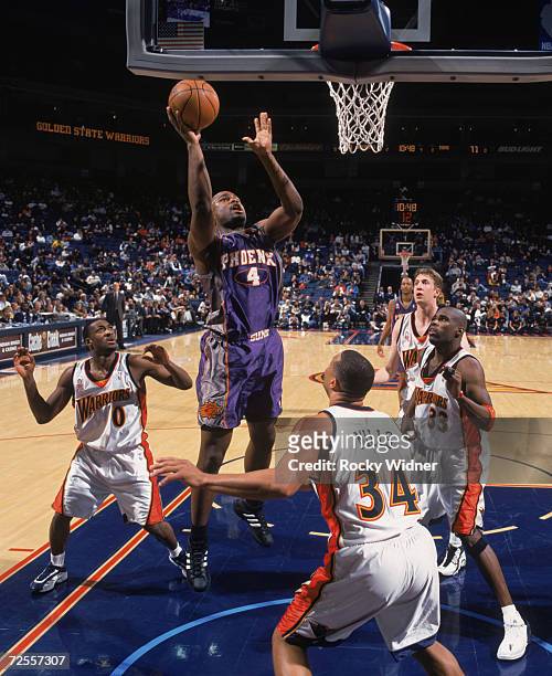 Forward Alton Ford of the Phoenix Suns shoots the ball during the NBA game against the Golden State Warriors at the Arena in Oakland in Oakland,...