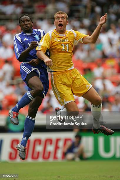 Robin Frazer of the East All-Stars and Jimmy Conrad of the West All-Stars battle for the ball during the Sierra Mist MLS All-Star Game at RFK Stadium...