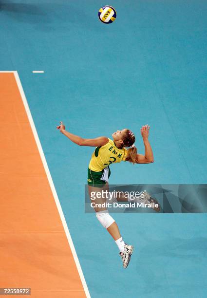 Erika Coimbra of Brazil serves during USA's 2-3 loss to Brazil in women's indoor Volleyball quarterfinal match on August 24, 2004 during the Athens...
