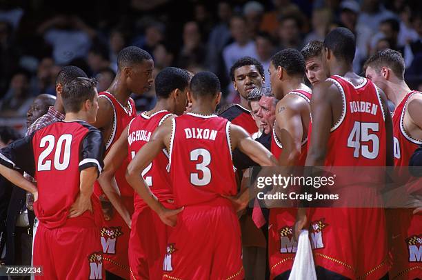 Head Coach Gary Williams of the Maryland Terrapins coaches the team in a huddle during the ACC Tournament Game against the Duke Blue Devils at the...