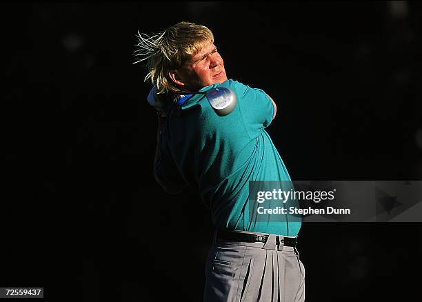 John Daly watches the ball after hitting it during the AT&T Pebble Beach in Pebble Beach, California. Mandatory Credit: Stephen Dunn /Allsport