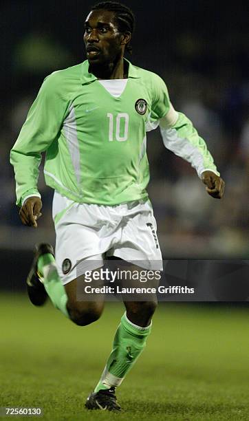 Jay Jay Okocha of Nigeria in action during the International Friendly match between Scotland and Nigeria played at the Pittodrie Stadium, in...