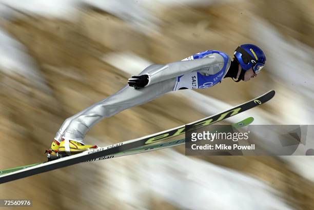 Adam Malysz of Poland competes in the Team K120 Ski Jumping event at the Utah Olympic Park in Park City during the Salt Lake City Winter Olympic...
