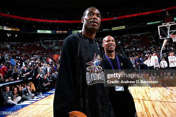 Dikembe Mutombo of the Philadelphia 76''ers and Head coach of the New Jersey Nets Byron Scott during practice before the 2002 NBA All Star Game at...