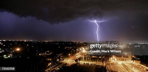 Lightning strikes the ground as a violent thunder storm approaches the area August 16, 2004 in Ft. Myers, Florida. The town of Punta Gorda, located...