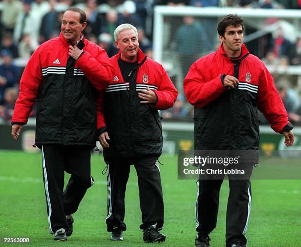 The new Fulham Management team: Alan Smith, Roy Evans and Karl-Heinz Riedler walking to the bench before the match between Fulham v Crystal Palace in...