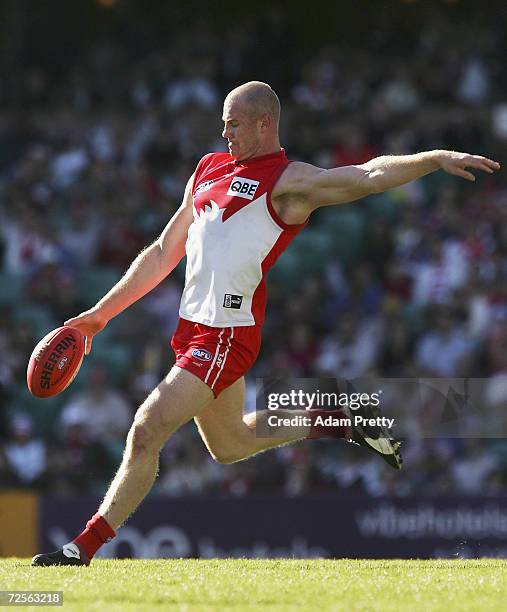 Barry Hall of the Swans kicks a goal during the round 17 AFL match between the Sydney Swans and the West Coast Eagles at the Sydney Cricket Ground...
