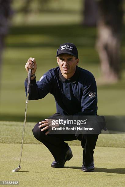 Tom Pernice Jr. Looks over a putt during the fourth round of the Bob Hope Chrysler Classic in La Quinta, California. DIGITAL IMAGE Mandatory Credit:...