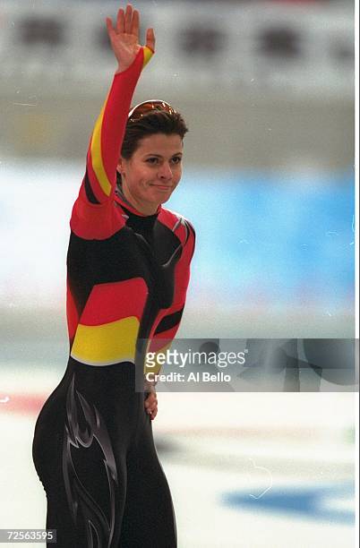Franziska Schenk of Germany waves to the crowd during the womens 500m speed skating competition at the M-Wave Arena during the 1998 Winter Olympic...