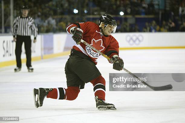 Paul Kariya of Canada shoots the puck during the Salt Lake City Winter Olympic Games at the E Center in Salt Lake City, Utah. DIGITAL IMAGE....