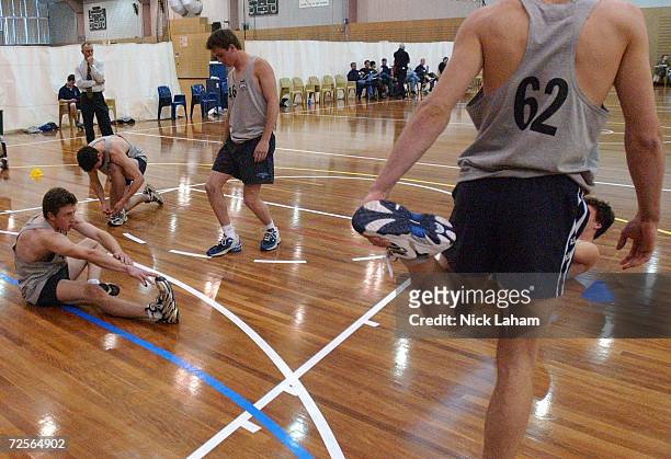 Potential AFL draft picks stretch ahead of their beep test at the 8th Official AFL Draft Camp held at the Australian Institute of Sport, Canberra,...