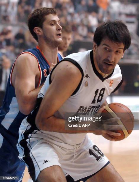 Partizan Belgrade's Predrag Drobnjak vies for the ball with Cibona Zagreb's Marin Rozic during their Euroleague Basketball group B match at the...