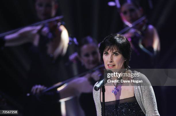 Singer Enya performs on stage during the 2006 World Music Awards at Earls Court on November 15, 2006 in London.