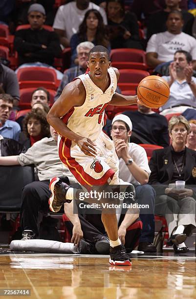 Guard Eddie Jones of the Miami Heat dribbles the ball during the NBA game against the Portland Trail Blazers at American Airlines Arena in Miami,...