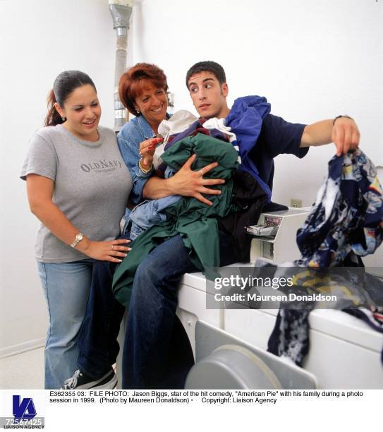 Jason Biggs, star of the hit comedy, "American Pie" with his family during a photo session in 1999.