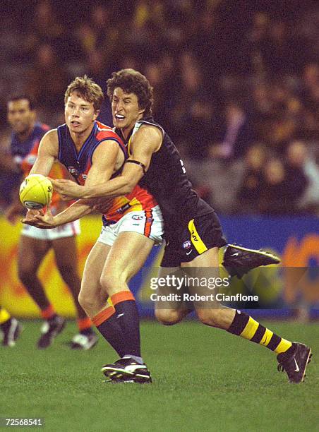 David Haynes for West Coast is tackled by Darren Gaspar for Richmond during round 20 of the AFL season between the Richmond Tigers and the West Coast...