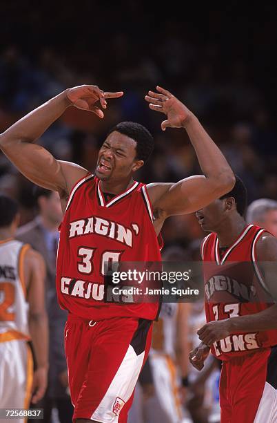 Lonnie Thomas of the Louisiana Lafayette Ragin Cajuns gets angry as he walks on the court during the first round of the NCAA Tournament Game against...