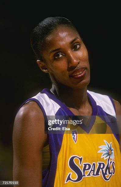 Lisa Leslie of the Los Angeles Sparks looks on during a game against the Houston Comets at the Great Western Forum in Inglewood, California. The...