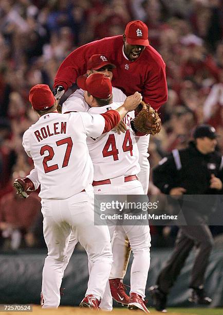 The St. Louis Cardinals celebrates after defeating the Houston Astros 5-2 in game seven of the National League Championship Series during the 2004...