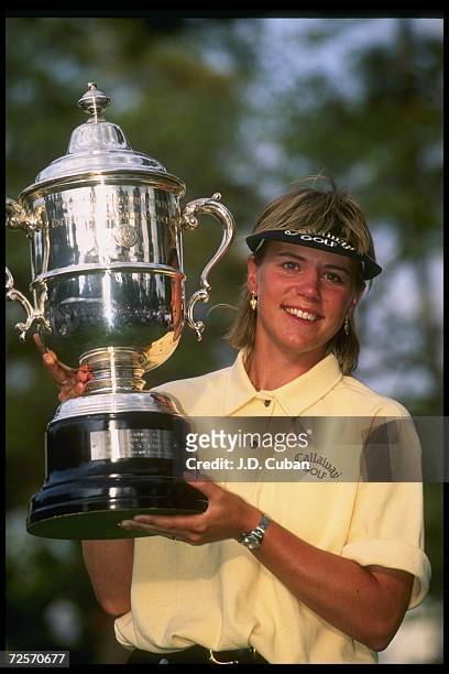 Annika Sorenstam poses with a trophy during the U.S. Women''s Open at Pine Needles in North Carolina. Mandatory Credit: J.D. Cuban /Allsport