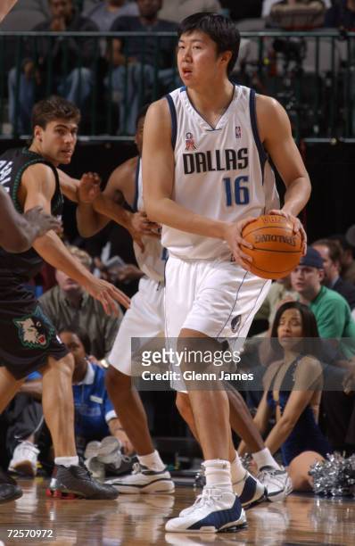 Zhizhi Wang of the Dallas Mavericks drives against the Minnesota Timberwolves at the American Airlines Center in Dallas, Texas. DIGITAL IMAGE NOTE TO...