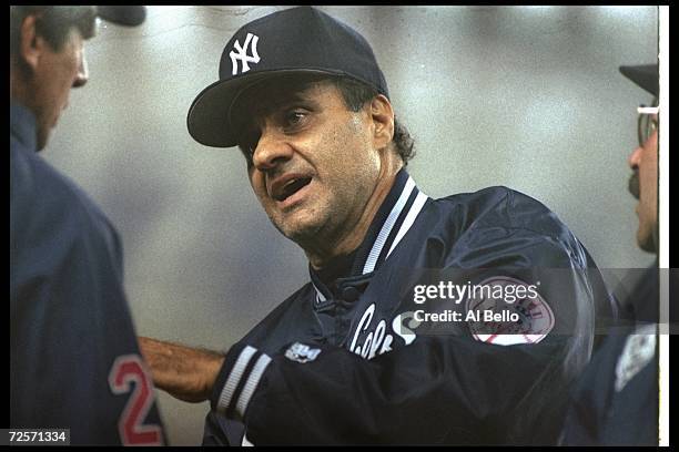 New York Yankees manager Joe Torre agrues with an official during a game against the Texas Rangers at Yankee Stadium in New York City, New York. The...