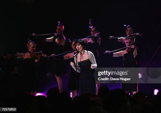 Singer Enya performs on stage during the 2006 World Music Awards at Earls Court on November 15, 2006 in London.