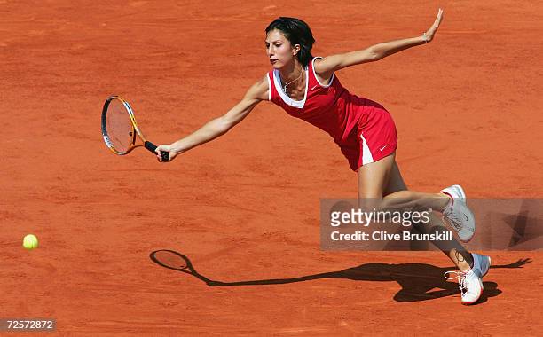 Anastasia Myskina of Russia returns in her womens final match against Elena Dementieva of Russia during Day Thirteen of the 2004 French Open Tennis...