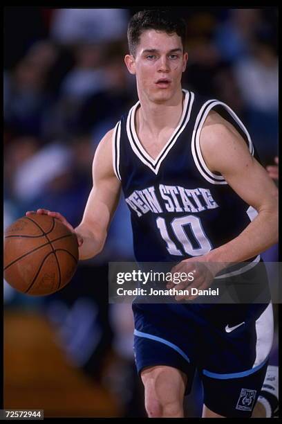 Guard Dan Earl of the Penn State Nittany Lions dribbles the ball down court against the Big Ten rival Northwestern Wildcats at Welsh-Ryan Arena in...