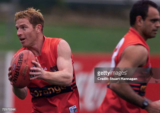 Gary Moorcroft and Michael Long of Essendon , during the clubs training session today, held at Windy Hill, Melbourne, Australia. Digital Image X...
