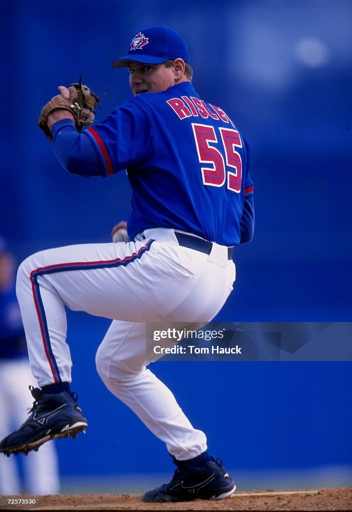 Pitcher Bill Risley of the Toronto Blue Jays in action during a... News ...
