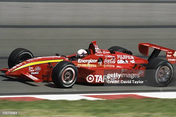 Juan Montoya of Columbia who drives a Honda Reynard 99I for Target/Chip Ganassi is in action during the practice before the Motorola 300, part of the...