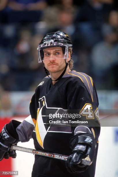 Rob Brown of the Pittsburgh Penguins looks on the ice during a game against the Calgary Flames at the Canadian Airlines SaddleDome in Calgary,...