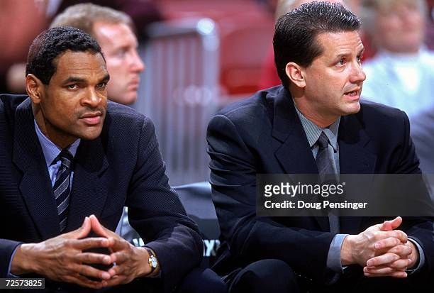 Assistant Coach Maurice Cheeks of the Philadelphia 76ers watches the action from the bench with John Calipari during a game against the Charlotte...