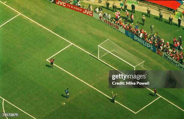 Roberto baggio misses the decisive penalty as brazilian goalkeeper claudio taffarel falls to his knees and raises his arms in victory as brazil wins...