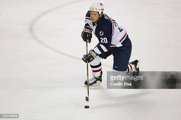 Gary Suter with the puck during the Salt Lake City Winter Olympic Games at the E Center in Salt Lake City, Utah. DIGITAL IMAGE. Mandatory Credit:...