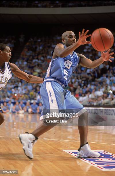 Ed Cota of the North Carolina Tar Heels passes the ball during the NCAA South Regional Game against the Tulsa Golden Hurricanes at the Frank Erwin...