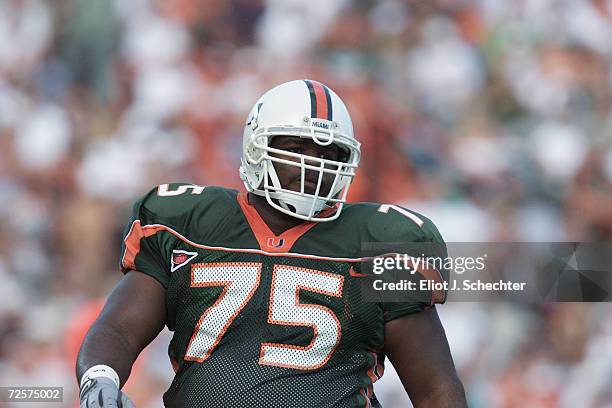 Defensive end Vince Wilfork of the Miami Hurricanes stands on the field during the Big East Conference football game against the Syracuse Orangemen...