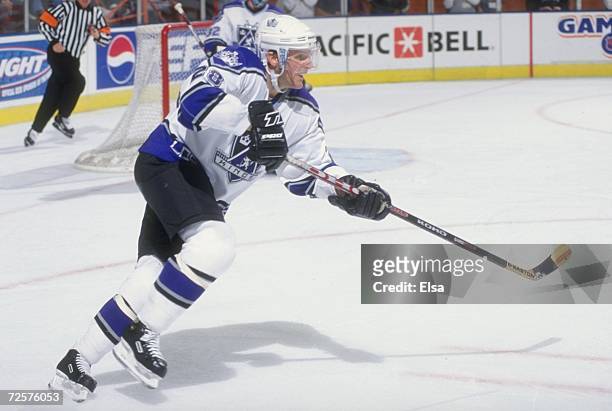 Defenseman Steve Duchesne of the Los Angeles Kings in action during the game against the St. Louis Blues at the Great Western Forum in Inglewood,...