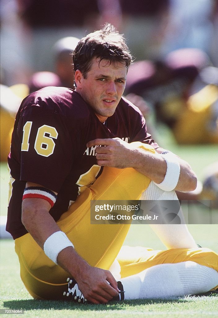 Quarterback Jake Plummer of Arizona State stretches prior to the Sun ...