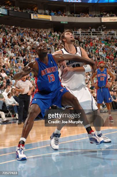 Nazr Mohammed of the Detroit Pistons and Mehmet Okur the Utah Jazz attempts to rebound the ball during the game on November 6, 2006 at the Delta...