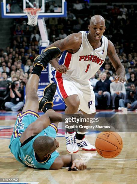 Chris Paul of the New Orleans/Oklahoma City Hornets tries to get control of the ball in front of Chauncey Billups of the Detroit Pistons on November...