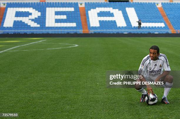 Real Madrid's new signing 18-year-old Marcelo Vieira Da Silva Junior, known simply as Marcelo poses during his presentation to the press after...