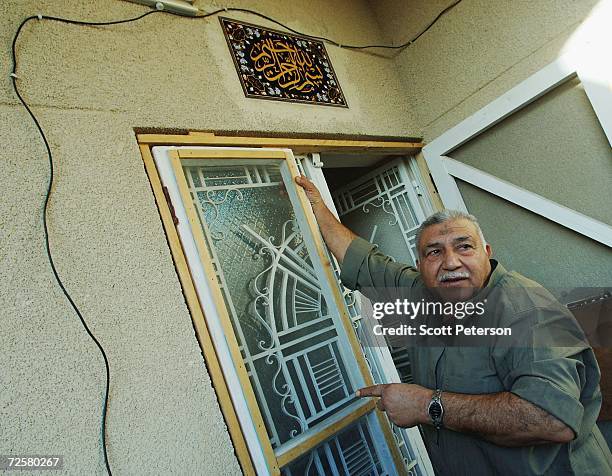 Iraqi patriarch Khudair al-Khafaji finishes rebuilding his house, nearly one year after a double suicide truck bombing targeting the Hamra Hotel...