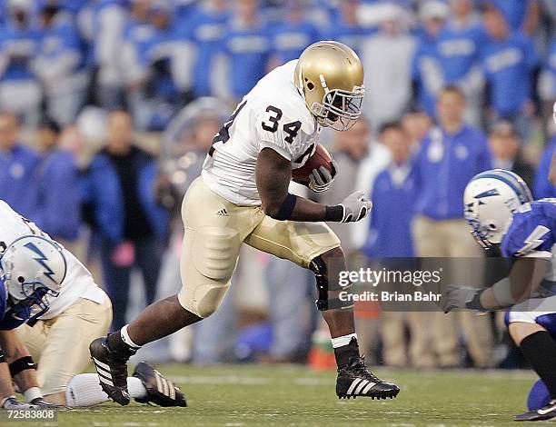 James Aldridge of the Notre Dame Fighting Irish carries the ball during the game against the Air Force Falcons on November 11, 2006 at Falcon Stadium...