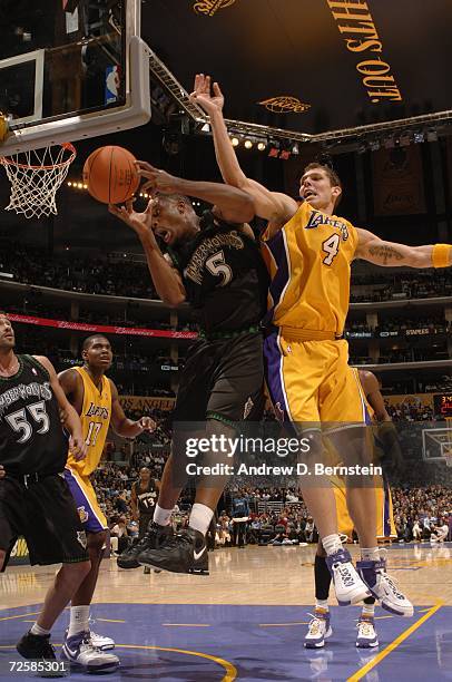 Craig Smith of the Minnesota Timberwolves grabs a rebound against Luke Walton of the Los Angeles Lakers during the game at Staples Center on November...