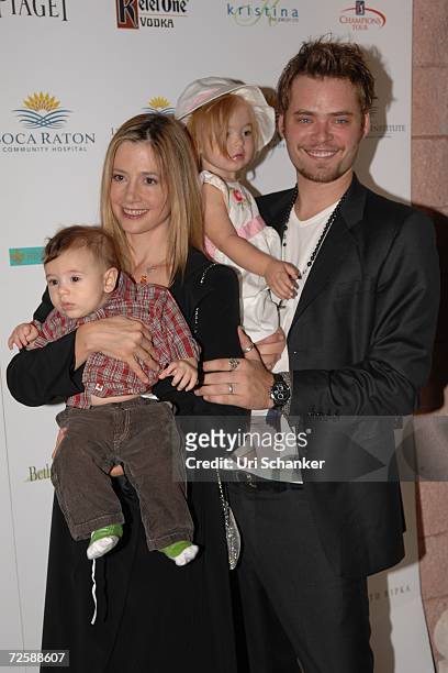 Mira Sorvino and husband Christopher Backus pose with their daughter Mattea Angel and son Johnny at the unveiling of Paul Sorvino's sculpture at the...