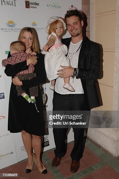 Mira Sorvino and husband Christopher Backus pose with their daughter Mattea Angel and son Johnny at the unveiling of Paul Sorvino's sculpture at the...